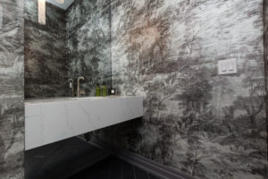 Photo of modern bathroom with floral wallpaper
