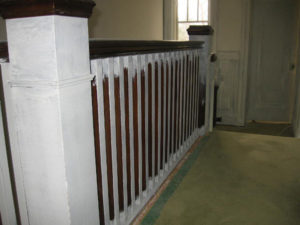 Image 2 of banister railing during refinishing