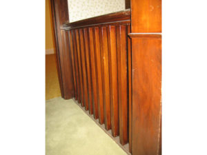 Image 1 of banister railing before refinishing