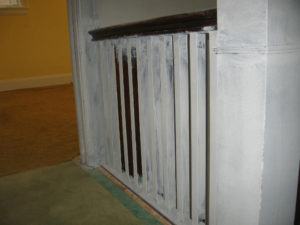 Image 1 of banister railing during refinishing